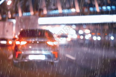 夜间雨车灯城市秋季公路10月高速公路交通夜深晚背景图片