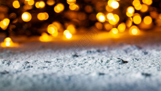 雪和圣诞灯背景图片