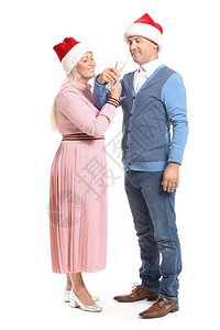 穿着圣诞老人帽子的快乐成熟情侣的肖像图片