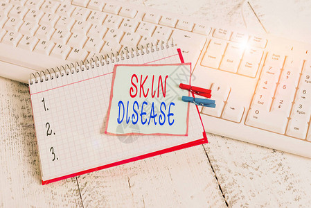 概念意指影响光滑皮肤笔记本的疾病或紊乱图片