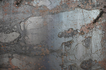 质地是金属的来自旧生锈金属的工业背景带锈裂纹的图片