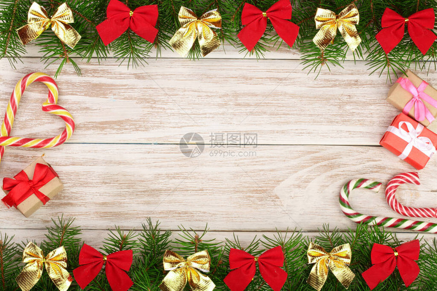 圣诞框架由圆形树枝组成图片
