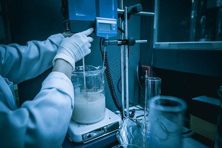 脱氧核糖酸亚洲科学家在实验室工作做客户实验使用背景