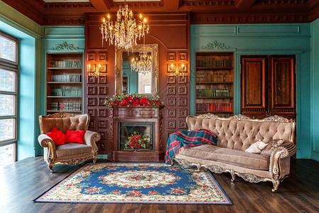 家庭图书馆的豪华经典内部客厅配有书架书籍扶手椅沙发和壁炉干净而现代的装饰与优雅的家具教育阅读背景图片