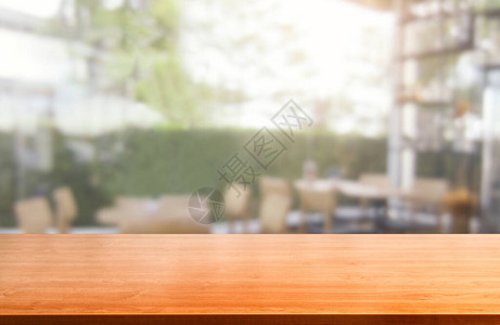 现代餐厅或咖啡店的木板背景模糊图片