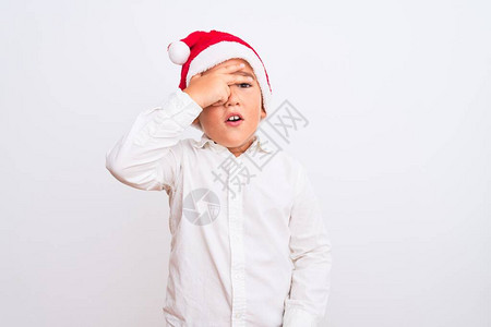 漂亮的男孩戴着圣诞帽图片