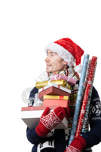 照片来自圣诞老人帽子内带礼物盒用空白色背景的纸包背景图片