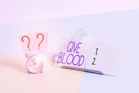 自愿展示的商业概念有抽血和用于输血的闹钟图片