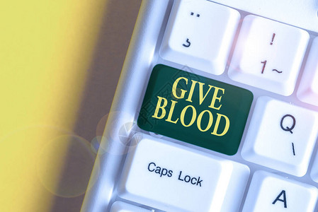 手写文本献血展示自愿抽血并用于输血的概念照片白色pc键盘图片