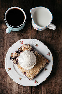 土制新鲜蓝莓果饼夹冰淇淋背景图片