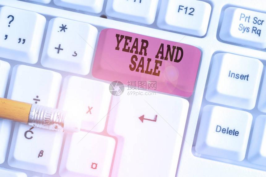 文字书写文本年和销售展示年度折扣假日季节清关的商业照片传统白色pc键盘图片