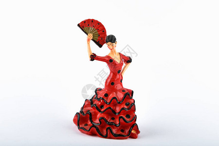 巴西女孩身着红色连衣裙与扇子跳舞的雕像图片