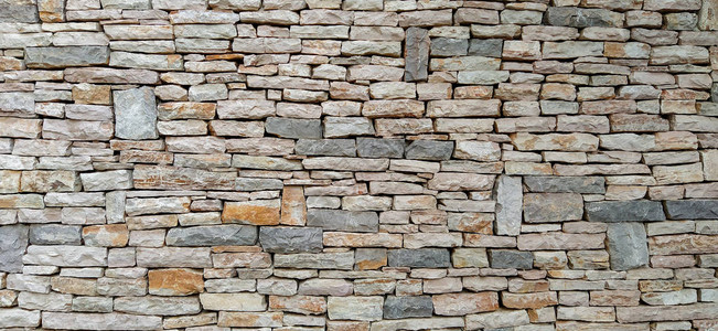 由石头和岩石等天然材料制造的冷酷和现代巨型壁纸墙图片