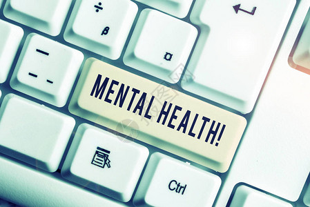 手写文本心理健康概念照片展示了他们的心理健康状况白色pc键盘图片