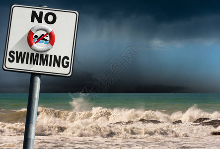 不游泳在海滩上有危险标志海崎岖图片