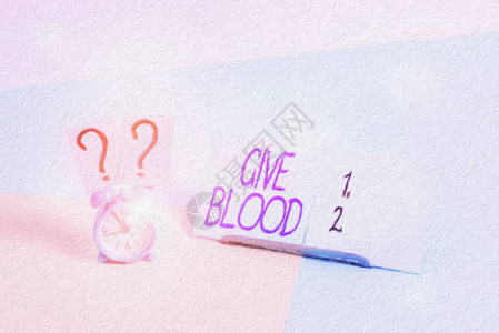 自愿展示的商业概念有抽血和用于输血的闹钟图片