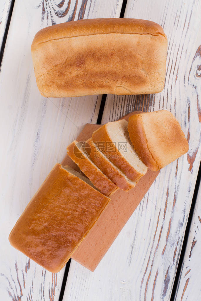 木本底的切片面包白面包图片