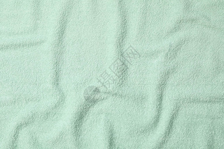 绿色毛巾纹理背景特写和文本空间图片