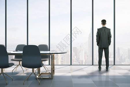 商人站在现代工作会议室背景图片