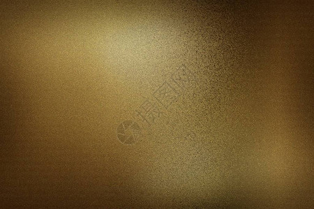 暗室深棕色金黄色金属墙壁背景图片