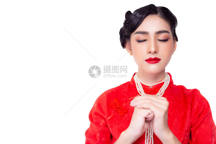 传统美丽的年轻女人许愿女孩在农历新年许愿有魅力的年轻亚洲女人穿服饰图片