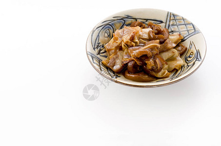日本食物冲绳菜炒鸡肉猪头的图片