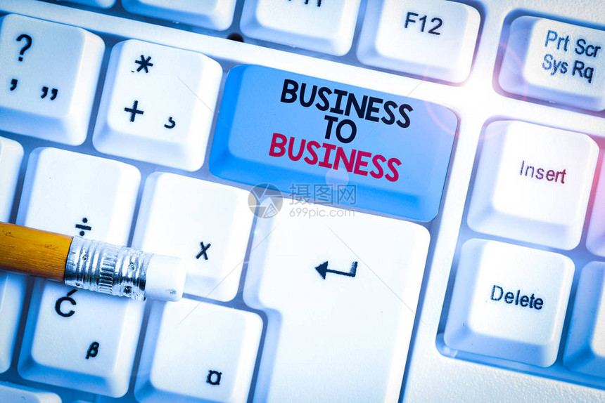 显示企业对企业的书写笔记两家企业之间商业交易的商业概念白色pc键盘图片