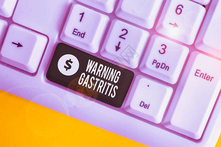 手写文字书写警告胃炎关于胃内壁炎症的概念照片早期建议白色pc键盘图片