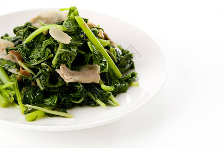 白盘炒苋菜和猪肉背景图片