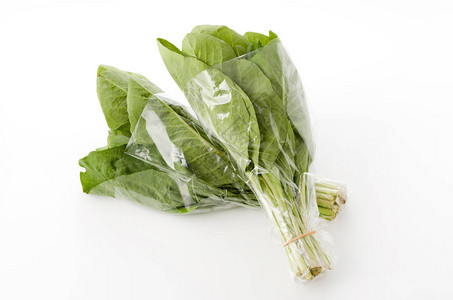 NiganaNjanaHosobawadan白底塑料袋中的绿叶蔬菜图片