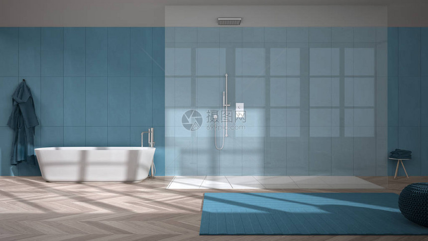宽敞的蓝色浴室配有人字形镶木地板步入式淋浴间和独立浴缸瓷砖带坐垫的地毯浴袍和毛巾简图片
