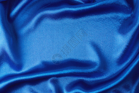 带折叠的蓝色丝绸背景纹理色平图片