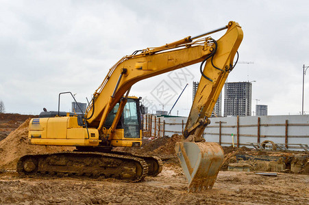 大亮黄色强力工业重型挖掘机拖拉机推土机大城市新微区建设期间道路维修图片