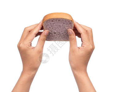 手握葡萄面包在白色图片