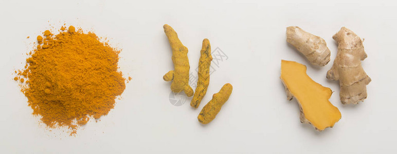 苦参根提取物白色背景的姜黄提取物粉末和根用作身体和食物成分背景