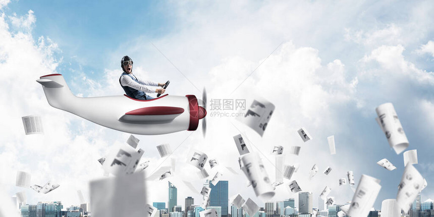 戴着飞行员帽子和护目镜驾驶螺旋桨飞机在城市景观之上的商人论文落在蓝天与云彩的背景上表达飞行员在小飞图片