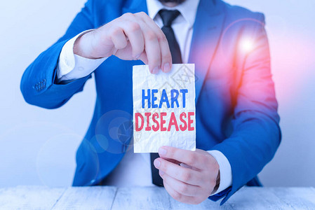 文字书写文本心脏病商业照片展示涉及心脏或血管的疾病男人拿着空纸图片