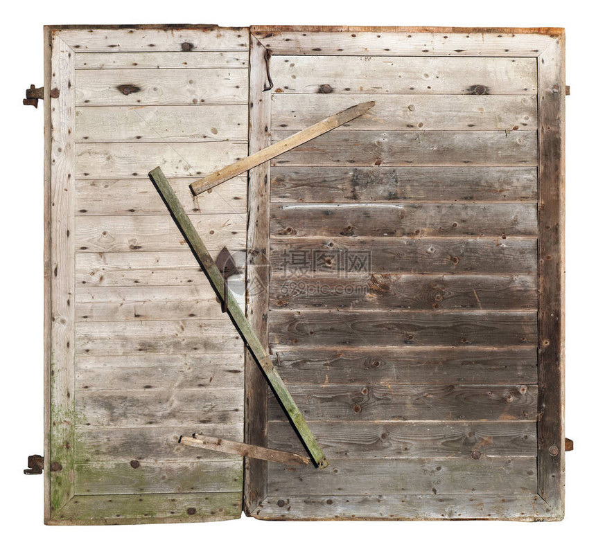 村庄谷仓的木制门被关闭并图片