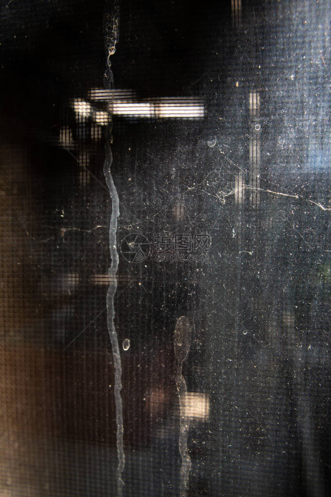 粉尘和肮脏的蚊子电线屏幕窗口反射关图片