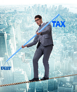 平衡债务和税收的商人图片