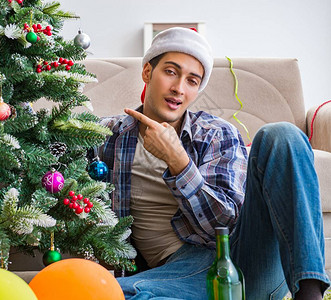 圣诞晚会后宿醉的男人背景图片