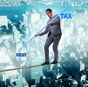 平衡债务和税收的商人图片