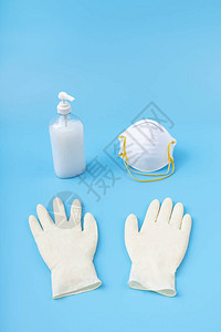 白色乳胶手套消毒凝胶和面罩保护概念防止污染流感和冠状病图片