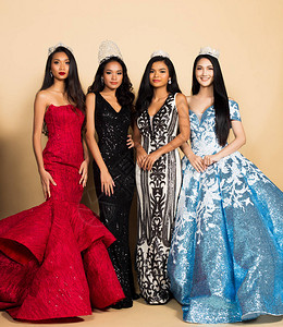 亚洲晚礼服亮片礼服与钻石皇冠腰带的四人选美小姐选美皇后大赛背景图片