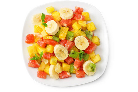 一碗健康的柑橘水果沙拉孤立在白色背景图片