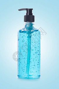 蓝色背景上用于抗细菌和的酒精凝胶消毒剂手凝胶清洁剂图片