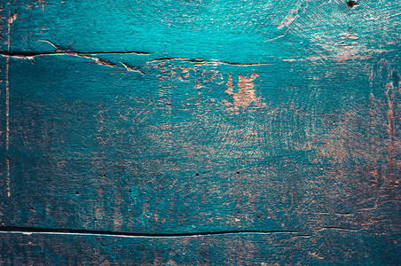 漆成蓝色的旧安伯木板油漆木材的纹理和锈制式梯图片