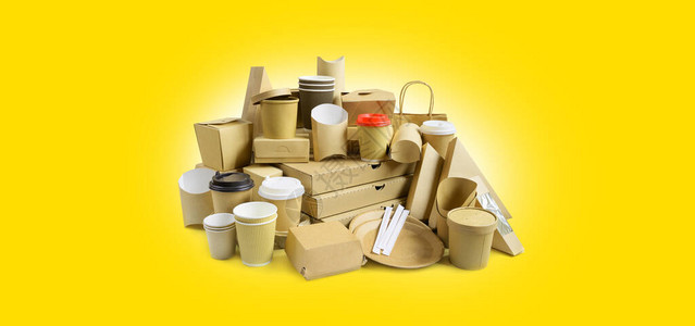 许多不同的外卖食品容器比萨盒支架中的咖啡杯和黄图片