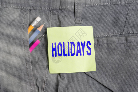 显示假期的书写笔记长时间远离家的休闲和娱乐的商业理念裤袋中的书写设备图片