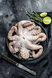 触手直播素材盘子里的原章鱼有烹饪素材黑色背背景